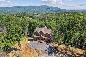 Exterior - Sleeps 22 with Fire Pit, View, Hot Tub, Game Room, Pool and Sport Court Access (Sevierville)