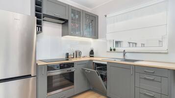 Apartment, 1 Bedroom, Balcony | Private kitchen | Fridge, oven, stovetop, dishwasher