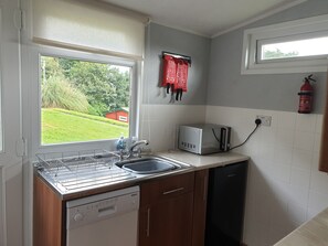 Cabana | Cozinha privada | Geladeira, micro-ondas, fogão, cooktop