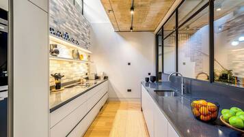 Comfort Duplex, 2 Bedrooms | Private kitchen | Full-size fridge, microwave, oven, stovetop