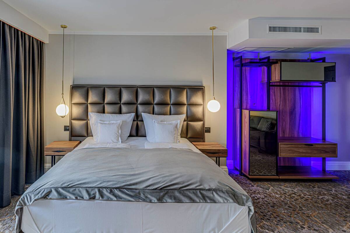 Deluxe Double Room | In-room safe, desk, laptop workspace, blackout drapes