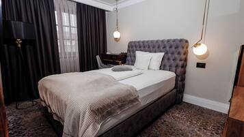Superior Room, Courtyard View | In-room safe, desk, laptop workspace, blackout drapes