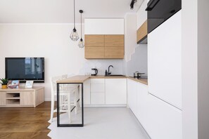 Apartment, 1 Bedroom, Balcony | Private kitchen | Oven, dishwasher, coffee/tea maker, electric kettle - Wrocławska Apartament by Renters (Kraków)