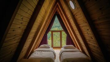 Premium bedding, pillow-top beds, desk, laptop workspace