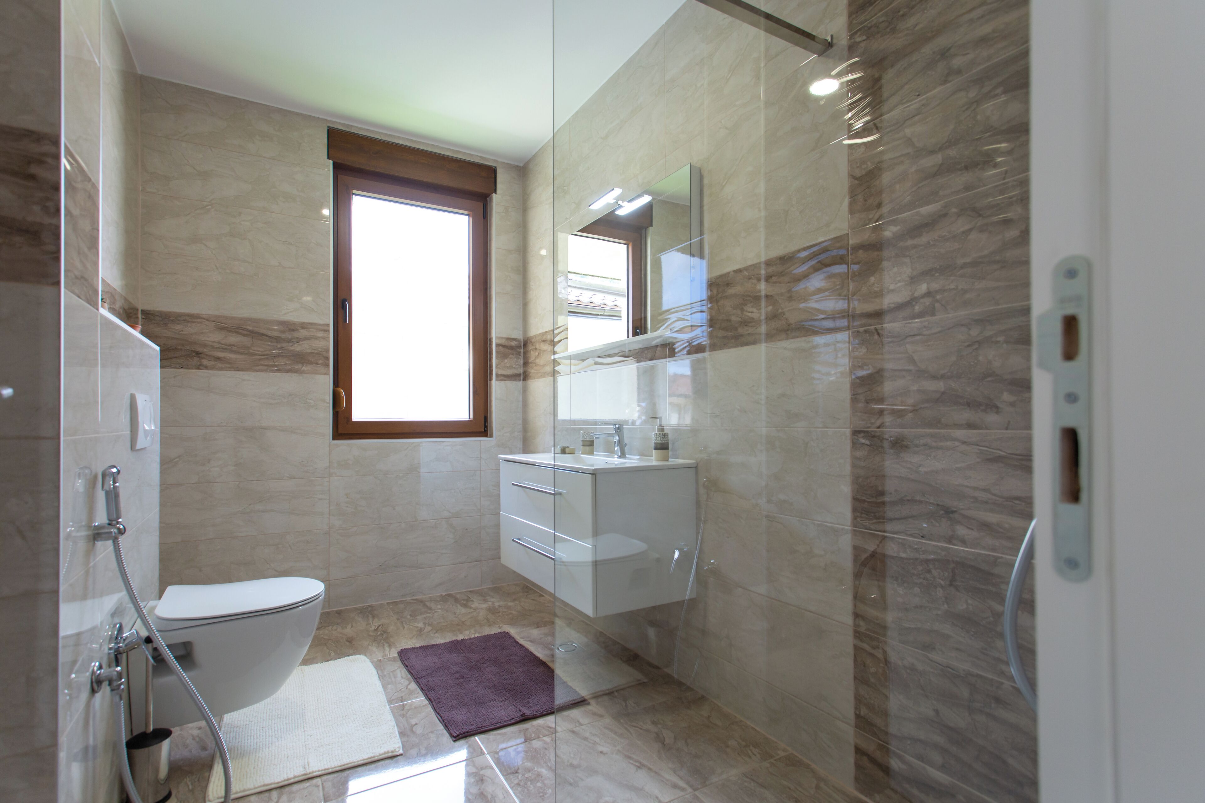 Villa Deluxe | Baño | Ducha, cabezal de ducha tipo lluvia y toallas