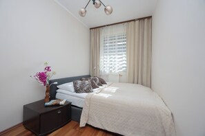 Apartment, 1 Schlafzimmer, Balkon | 1 Schlafzimmer, kostenloses WLAN, Bettwäsche