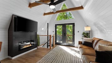 Smart TV, fireplace, table football, books