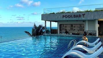 5 outdoor pools, open 6:00 AM to 8:00 PM, pool umbrellas, pool loungers