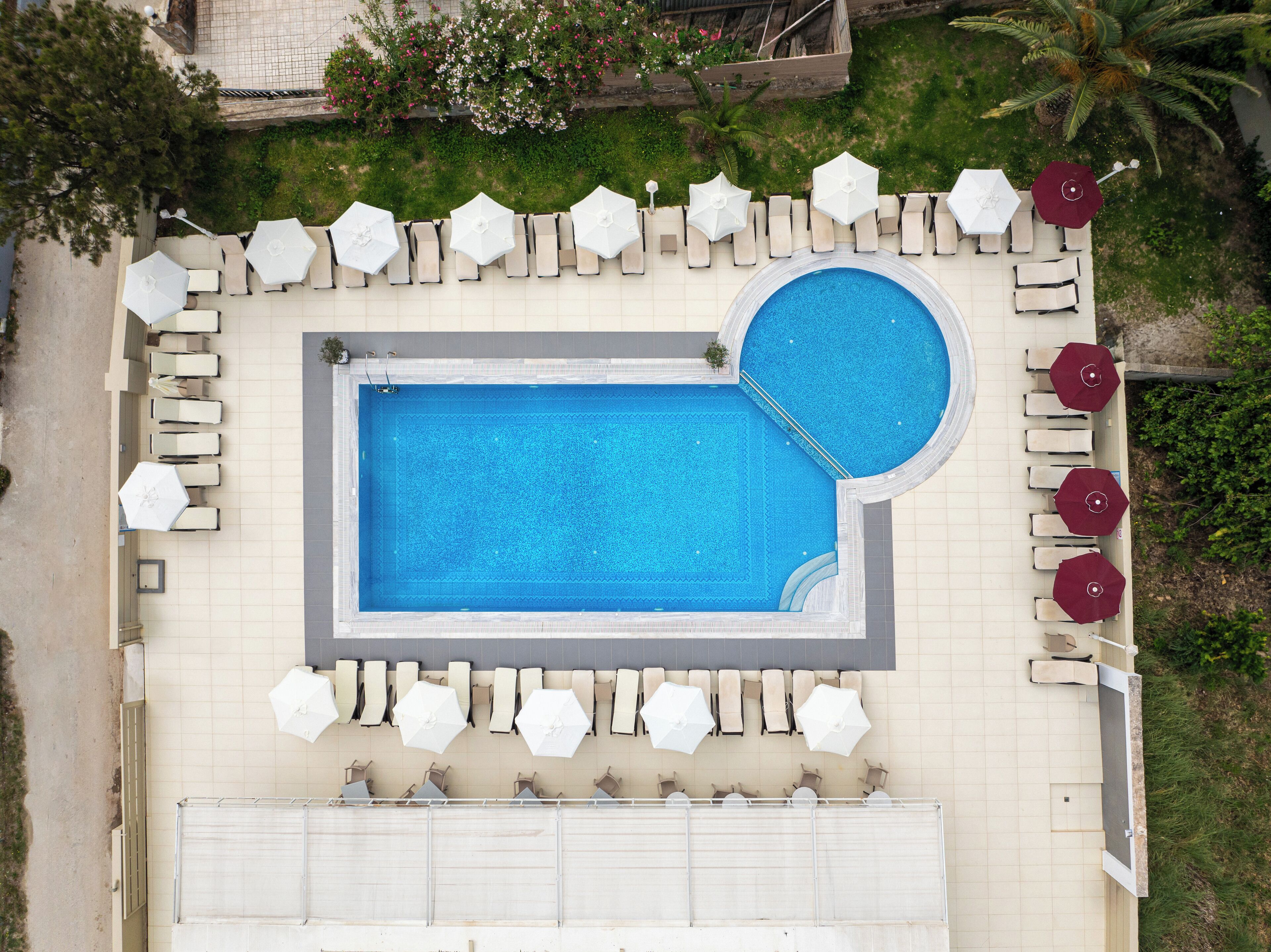 Outdoor pool, pool umbrellas, pool loungers