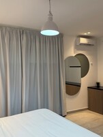 The GreenEden | Down comforters, Select Comfort beds, in-room safe, laptop workspace