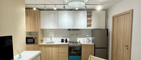 The CosySuit | Area soggiorno | TV 55 pollici con canali digitali, Netflix, servizi in streaming