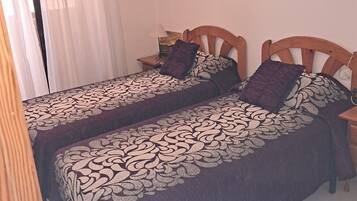 2 dormitorios, tabla de planchar con plancha, wifi y ropa de cama