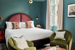 Roomy | Premium bedding, minibar, in-room safe, blackout drapes