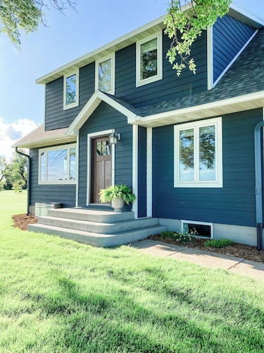 Beautiful cozy country home located on 12 acres in a great farming community.