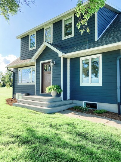 Beautiful cozy country home located on 12 acres in a great farming community.