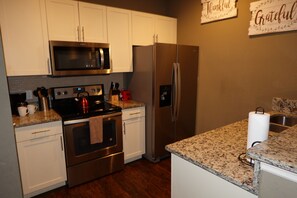Microwave, oven, stovetop, dishwasher - Beautiful, Spacious 3BD Townhome/W HotTub & Pool 15 mins from Disney!  (Kissimmee)