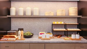 A breakfast buffet with various food items and condiments. - Ji Hotel Hangzhou Xiaoshan People Square (Hangzhou)