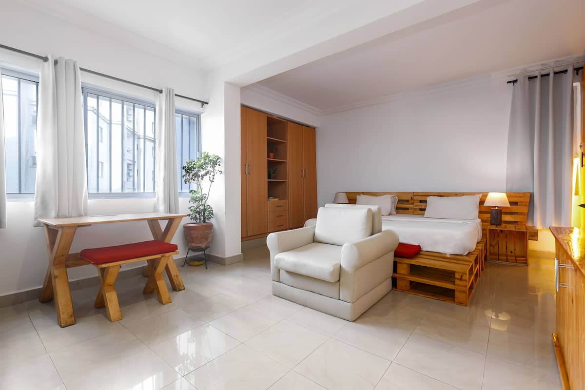Deluxe Suite, 1 King Bed, Non Smoking, City View | In-room safe, desk, laptop workspace, iron/ironing board (on request)
