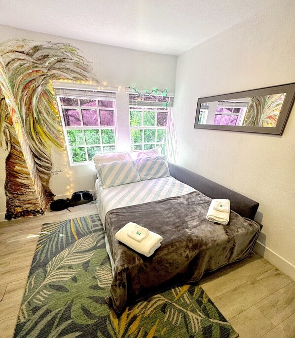 2 bedrooms, desk, iron/ironing board, travel crib