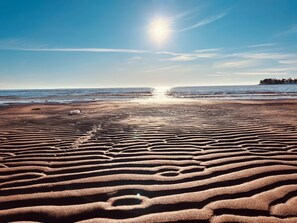 On the beach, sun loungers, beach towels