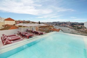 Indoor pool, outdoor pool, open 8:00 AM to 9:00 PM, sun loungers