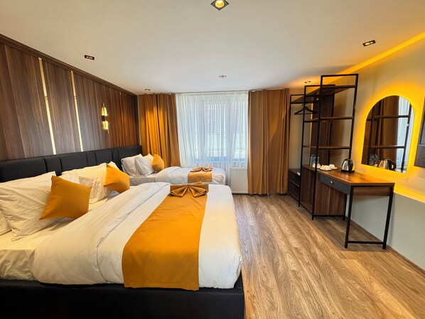 Standard Triple Room | Minibar, desk, laptop workspace, blackout curtains - Galata Calm Tale Hotel (Istanbul)