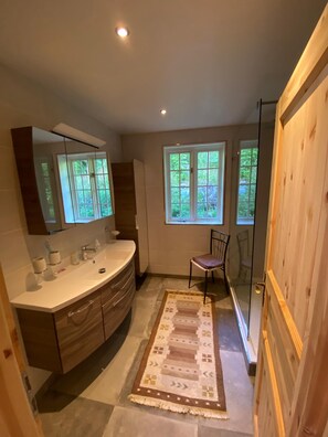 Shower, hair dryer, towels, soap