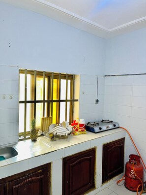 Private kitchen - A cozy & serene stay in Cotonou, Benin. Close proximity to alot of places.  (Cotonou)