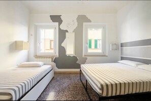 2 habitaciones, tabla de planchar con plancha, wifi y ropa de cama
