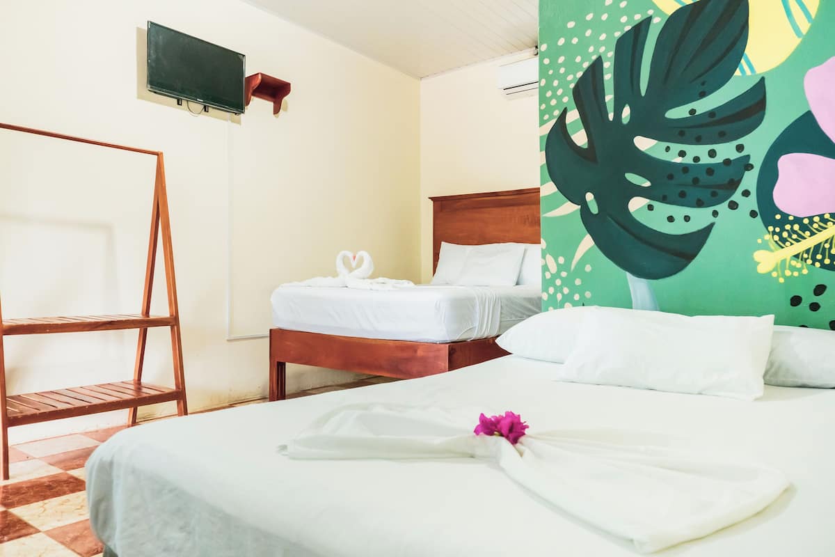 Comfort Quadruple Room | Premium bedding, Select Comfort beds, individually decorated