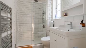 Eco-friendly toiletries, hair dryer, towels, soap