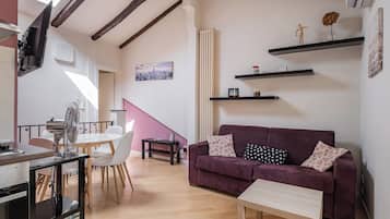 Apartment | Living area | 32-inch flat-screen TV with digital channels