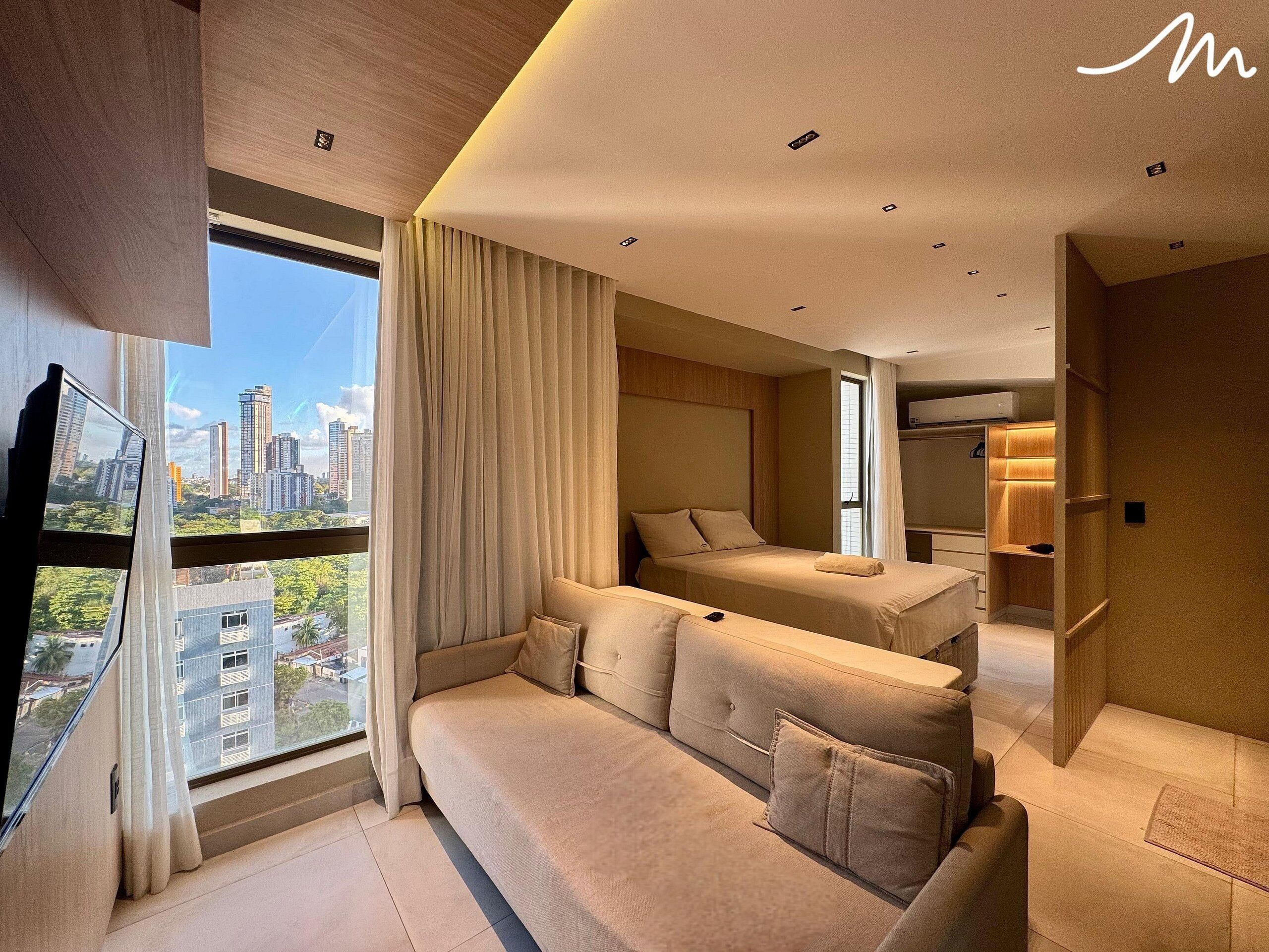 エクスクルーシブ アパートメント | リビング エリア | 32 インチのLED テレビ (衛星放送視聴可)