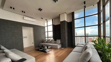 Apartment | Living area | 32-inch LED TV with satellite channels