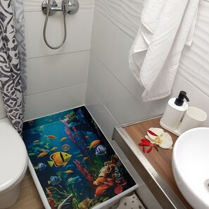 Dutxa, assecador de cabells, tovalloles i sabó