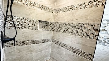Shower, towels, toilet paper