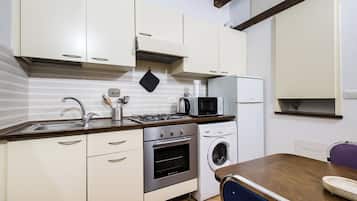 Apartment | Private kitchen | Espresso maker, coffee/tea maker, electric kettle, dining tables
