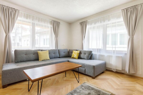 Aki Gray Apartment | Living area