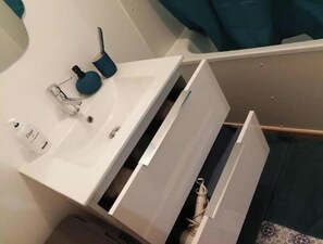 Hair dryer, towels, soap, shampoo