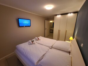 1 غرفة نوم ومكواة/لوح كي وواي فاي وملاءات أسرّة