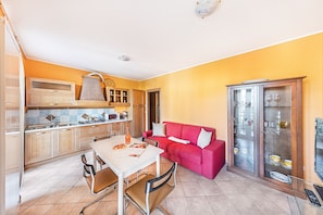 Apartment | Living area | 35-inch flat-screen TV with digital channels - Annamaria 9 Apartment by Wonderful Italy (Sirmione)