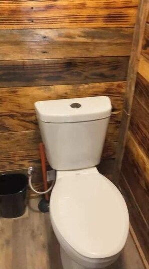 Shower, towels, shampoo, toilet paper