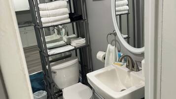 Hair dryer, towels, soap, shampoo