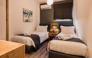 2 slaapkamers, een kluis op de kamer, een strijkplank/strijkijzer