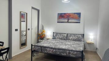 1 dormitori i roba de llit