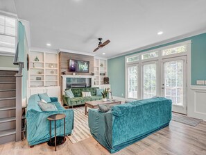 Smart TV, fireplace, books