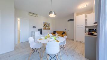 Apartment | Living area | 35-inch flat-screen TV with digital channels