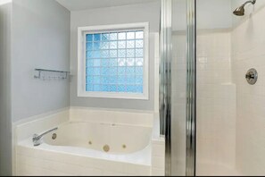 Shower, jetted tub, hair dryer, towels