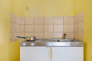 Fridge, stovetop, cookware/dishes/utensils