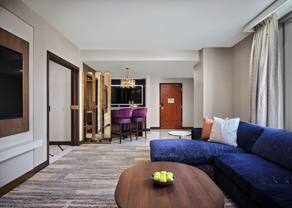 Superior Suite, 1 King Bed, Corner | Living area | 65-inch Smart TV with digital channels, streaming services